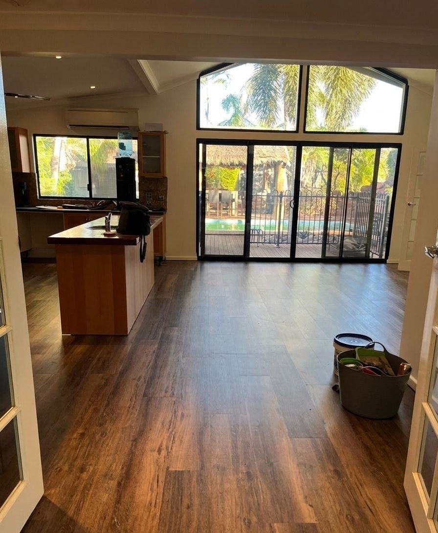 After: finished hybrid plank flooring